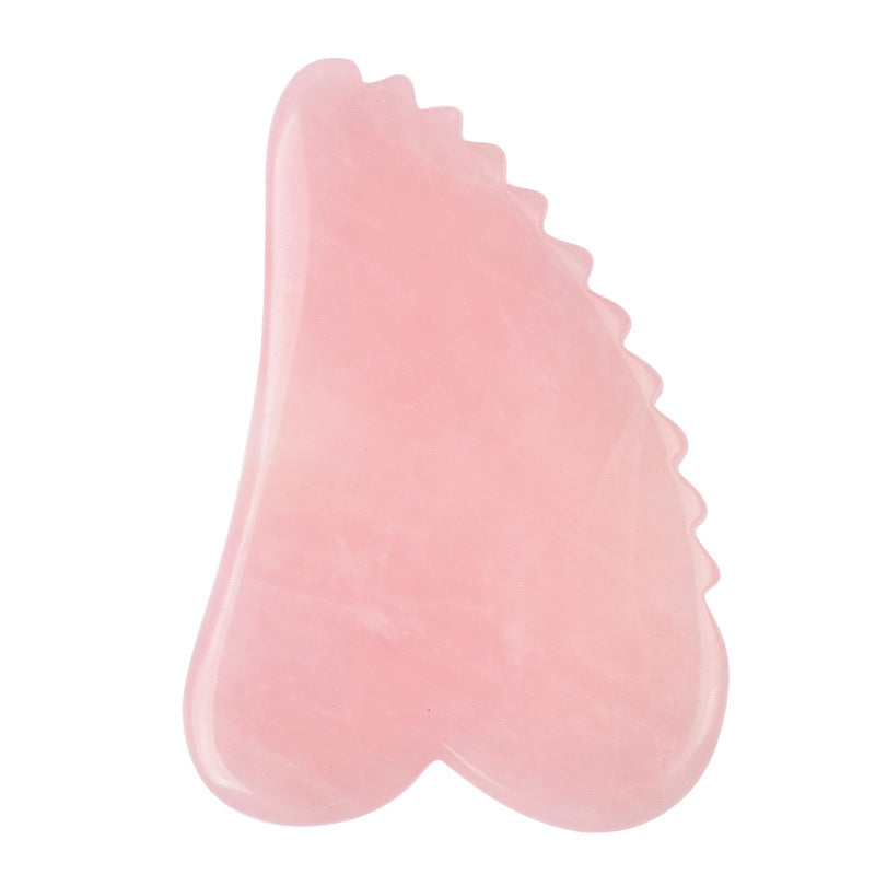 Gua sha en quartz rose, forme aile à crans